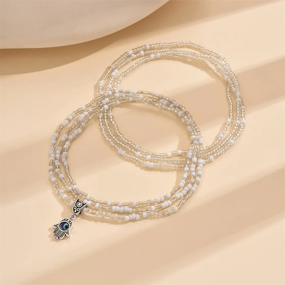 KRALEN -
 Schattige kleine handhanger met witte rijstkralen enkelbandjes voor dames, zilverkleurige voetketting, enkelarmbandje, strandsieraad, zomeraccessoire