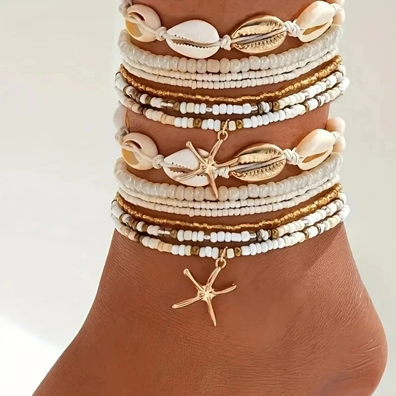 SHELLA - 
14Pcs/Set Bohemian Rice Beads Starfish Shell Anklet Sets for Women Retro Gold Color Multilayer Foot Chain Vacation Jewelry Gifts