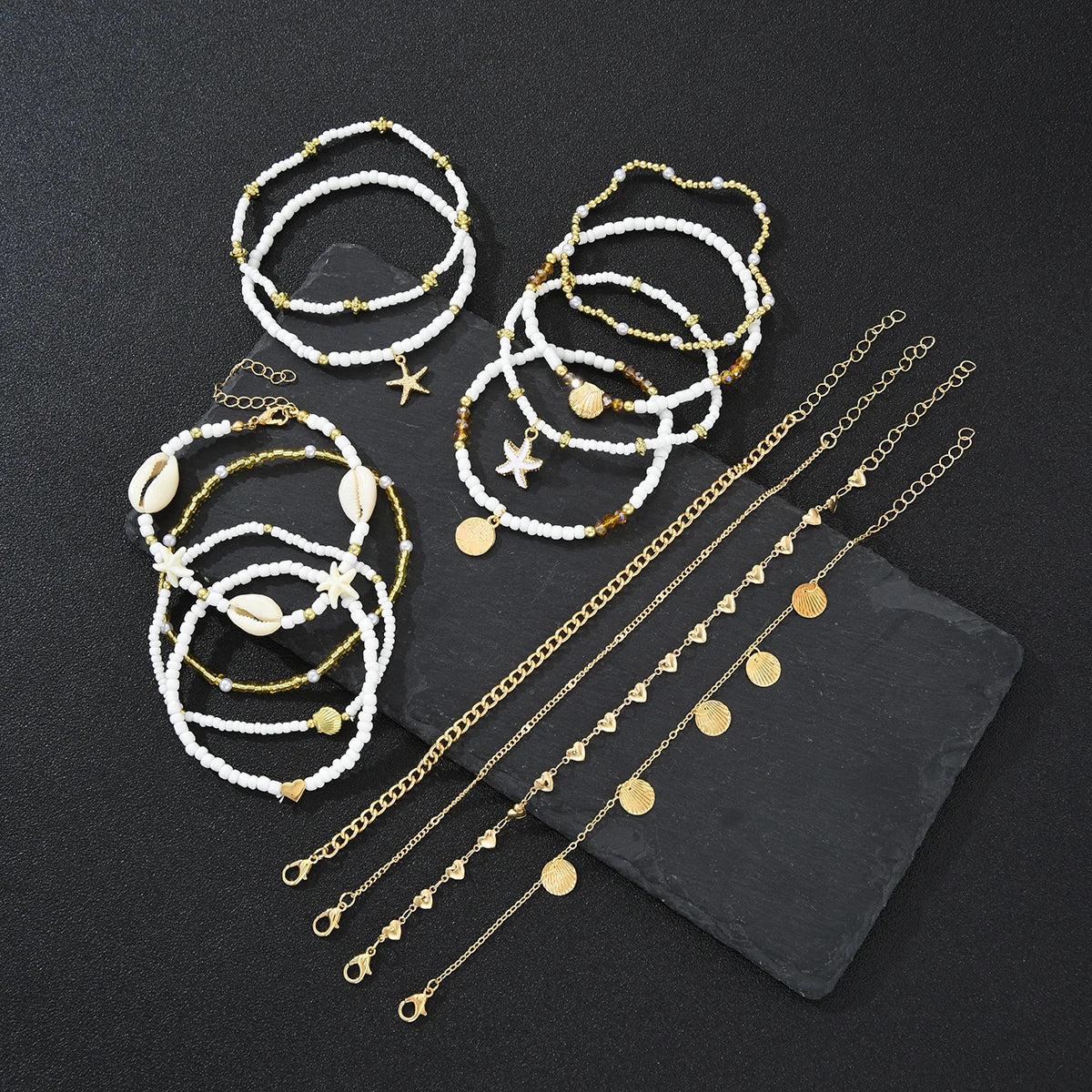 SHELLA - 
14Pcs/Set Bohemian Rice Beads Starfish Shell Anklet Sets for Women Retro Gold Color Multilayer Foot Chain Vacation Jewelry Gifts