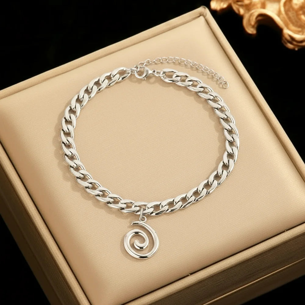SPIRALÉ - 
Stainless Steel Spiral Pendant Ankle Chain For Women Minimalist Cuban Chain Design Suitable For Everyday Wear Ankle Jewellery