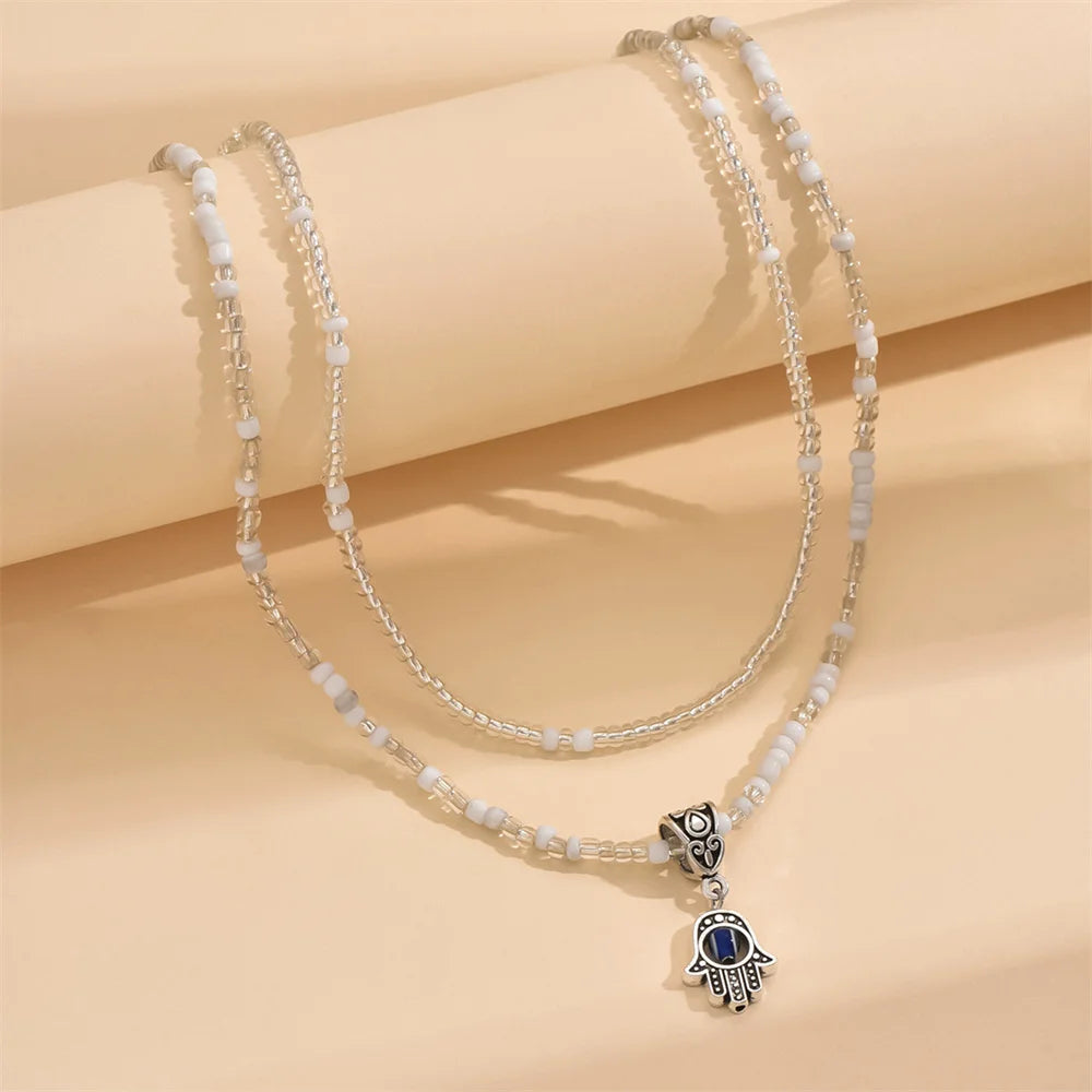 KRALEN -
 Schattige kleine handhanger met witte rijstkralen enkelbandjes voor dames, zilverkleurige voetketting, enkelarmbandje, strandsieraad, zomeraccessoire