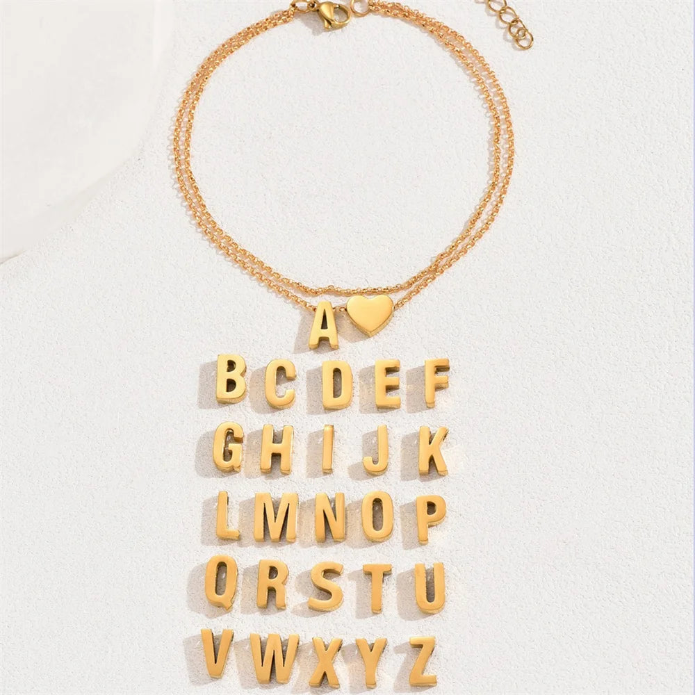 BOHOLYX -
 Boho enkelbandjes met 26 letters AZ van roestvrij staal voor dames, eenvoudige enkelbandjes met hartje, enkelbandjes voor op het strand, zomeraccessoires