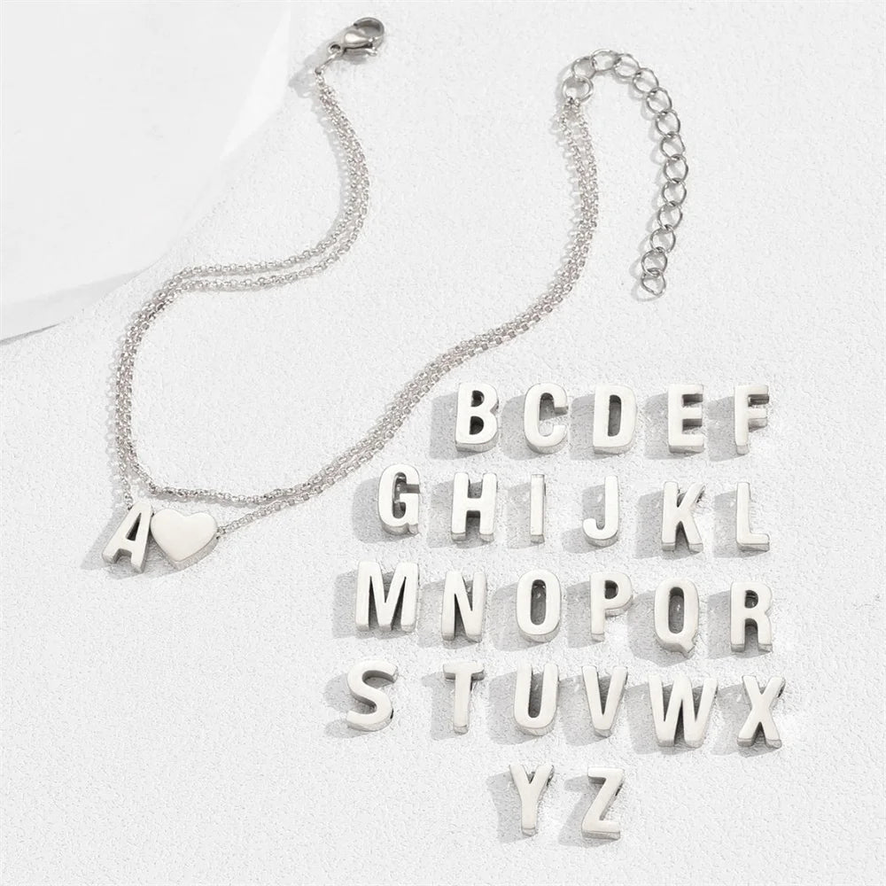 BOHOLYX -
 Boho enkelbandjes met 26 letters AZ van roestvrij staal voor dames, eenvoudige enkelbandjes met hartje, enkelbandjes voor op het strand, zomeraccessoires