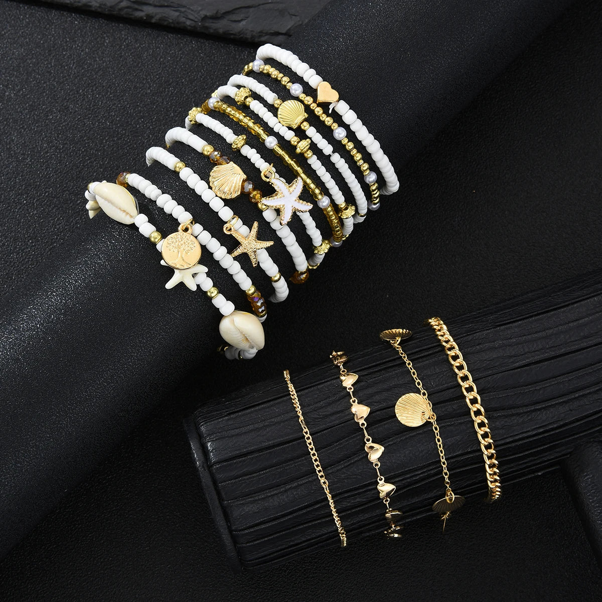 SHELLA - 
14Pcs/Set Bohemian Rice Beads Starfish Shell Anklet Sets for Women Retro Gold Color Multilayer Foot Chain Vacation Jewelry Gifts